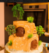 attachment-https://beigemarvelbakery.com/wp-content/uploads/2023/08/Fort-theme-cake-100x107.png